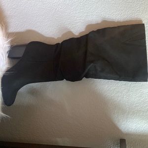 Black heeled boots slightly used size 5.5